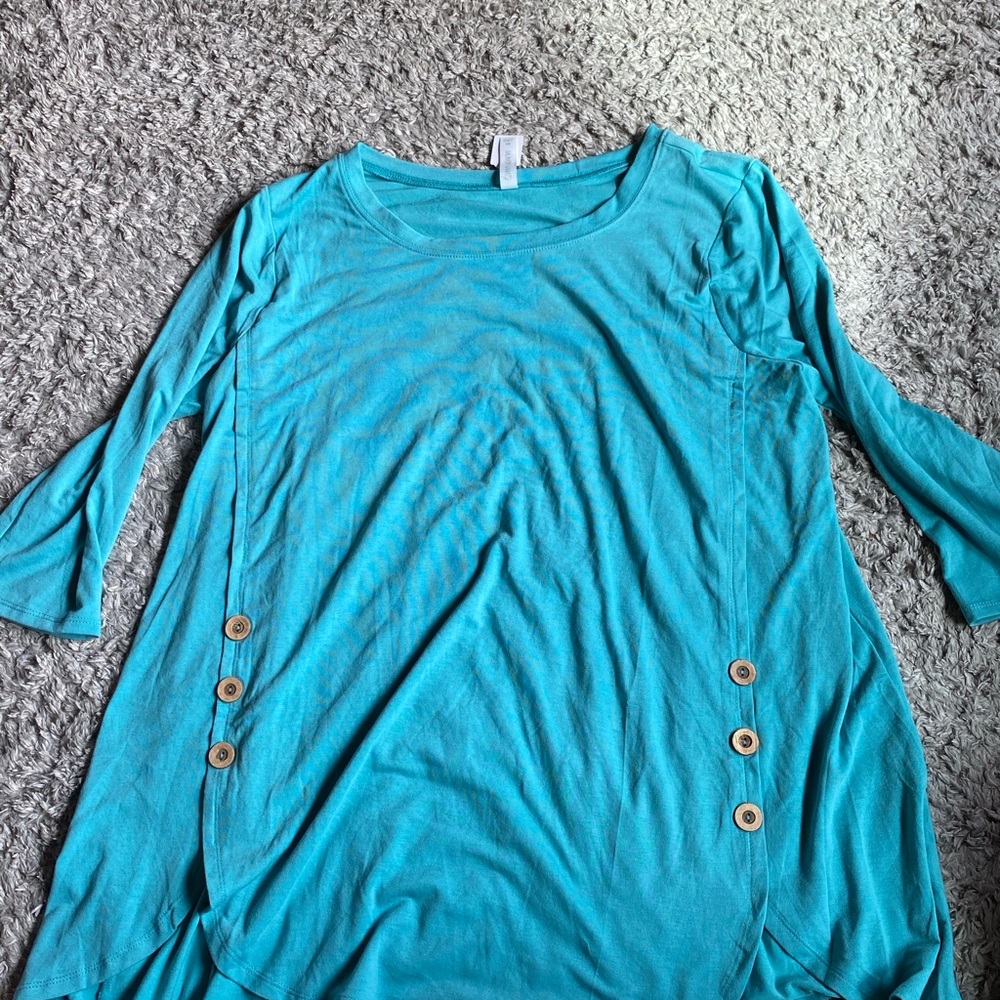 Two of the exact same top, different color